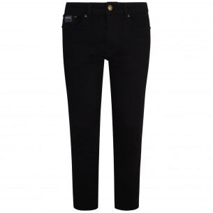 Jeans nero con mini logo...