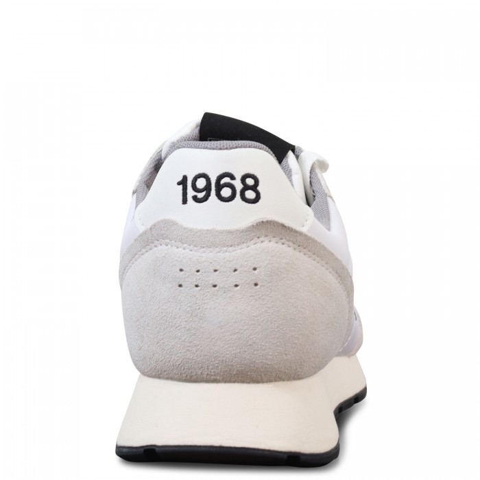 Sneakers bianca con riporti neri per...