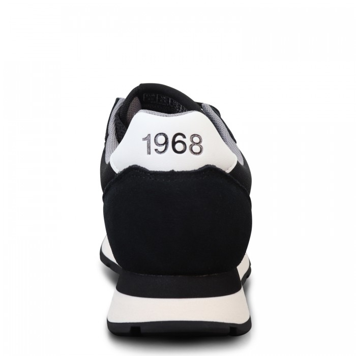 Sneakers nera con riporti bianchi per... Sneakers nera con riporti bianchi per...