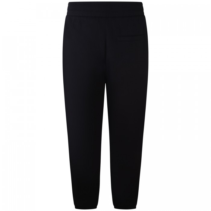 Pantalone tuta nero con bande logate... Pantalone tuta nero con bande logate...